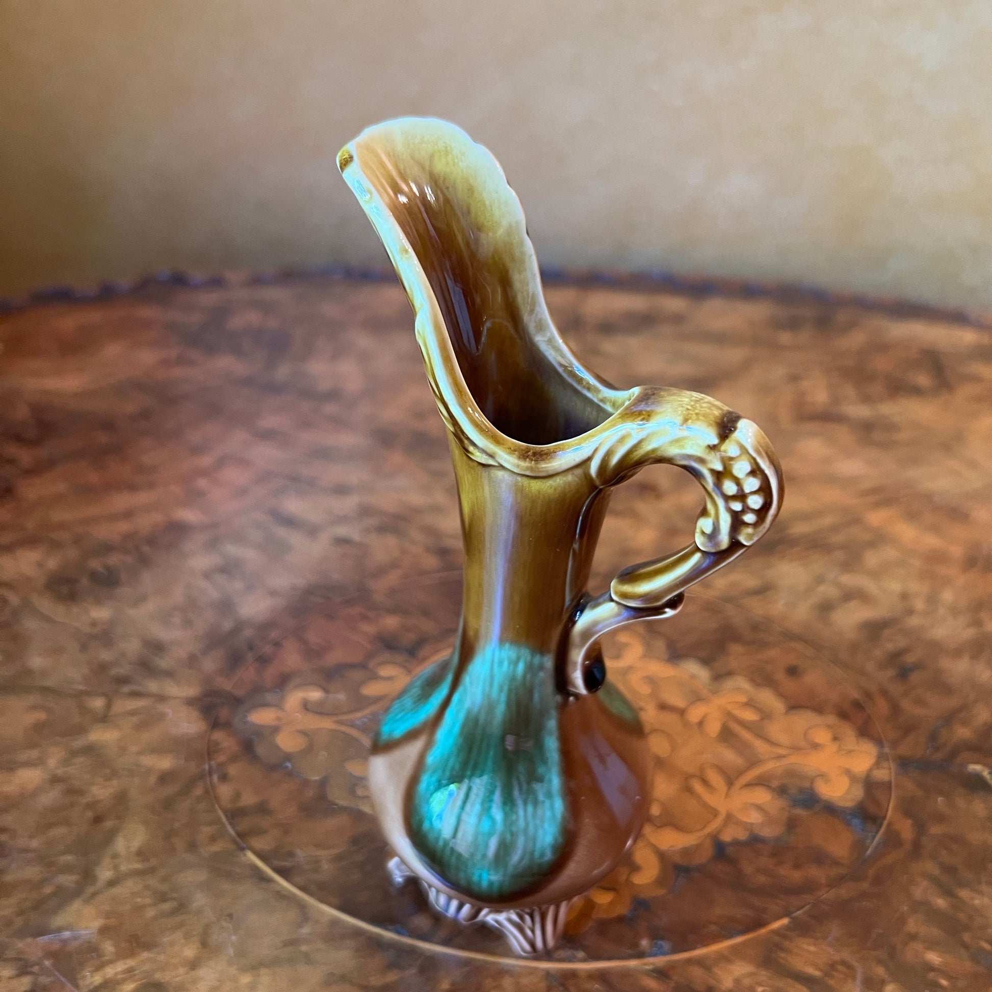 Brown and green jug