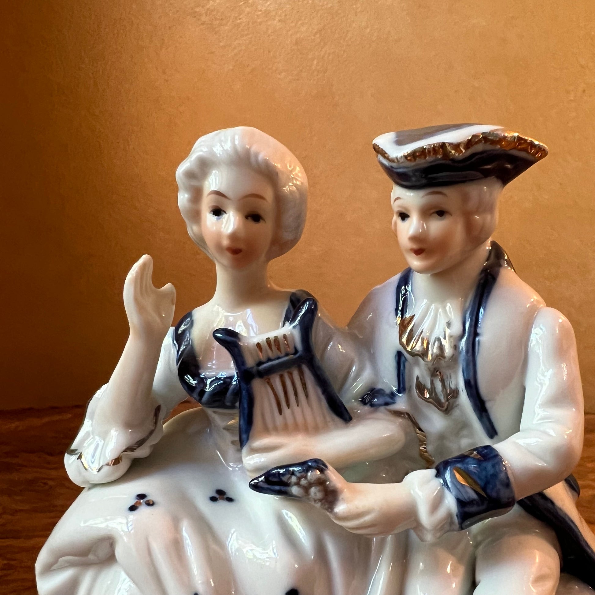 Colonial Couple Blue & White Figurine