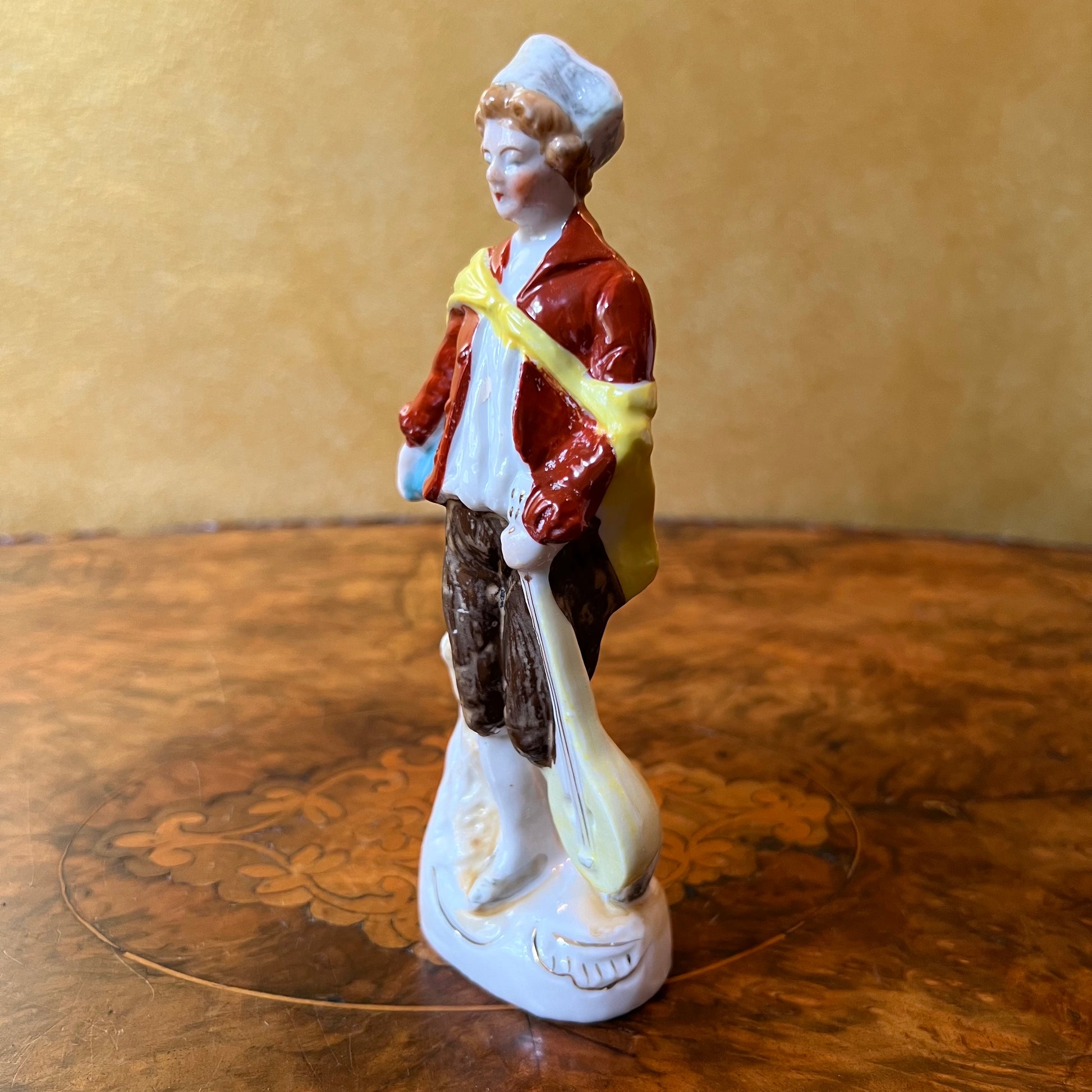 Musician Boy Statue
