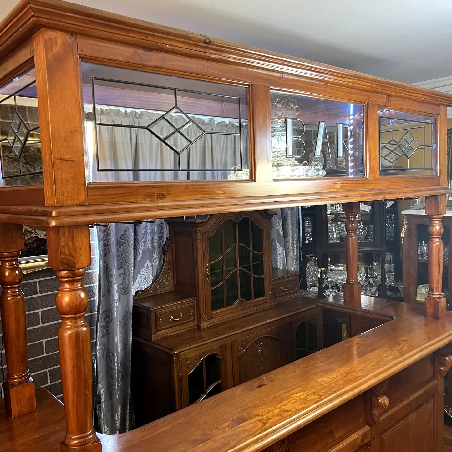 Bars with glass panels