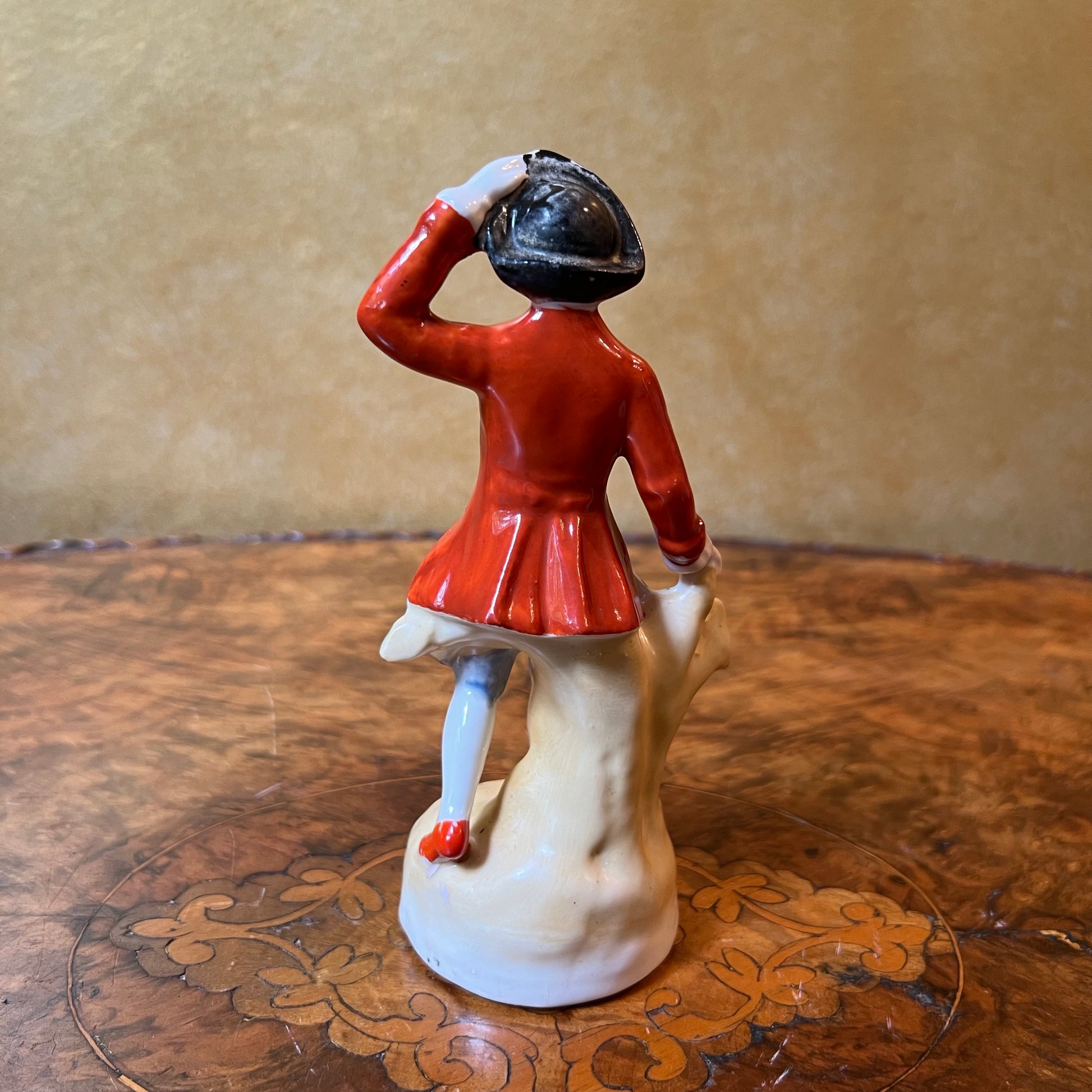Red Coat Man Figurine 
