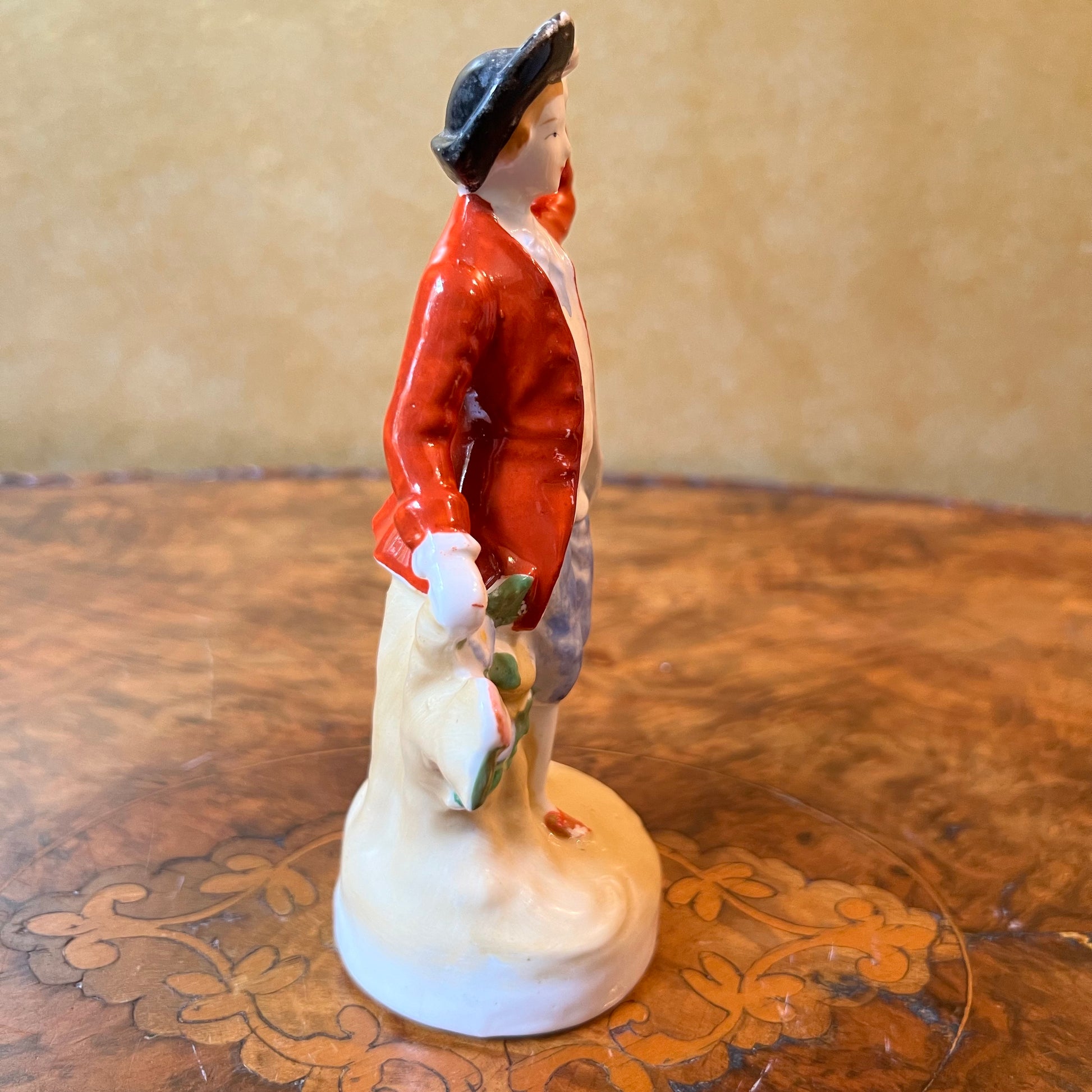 Red Coat Man Statue 