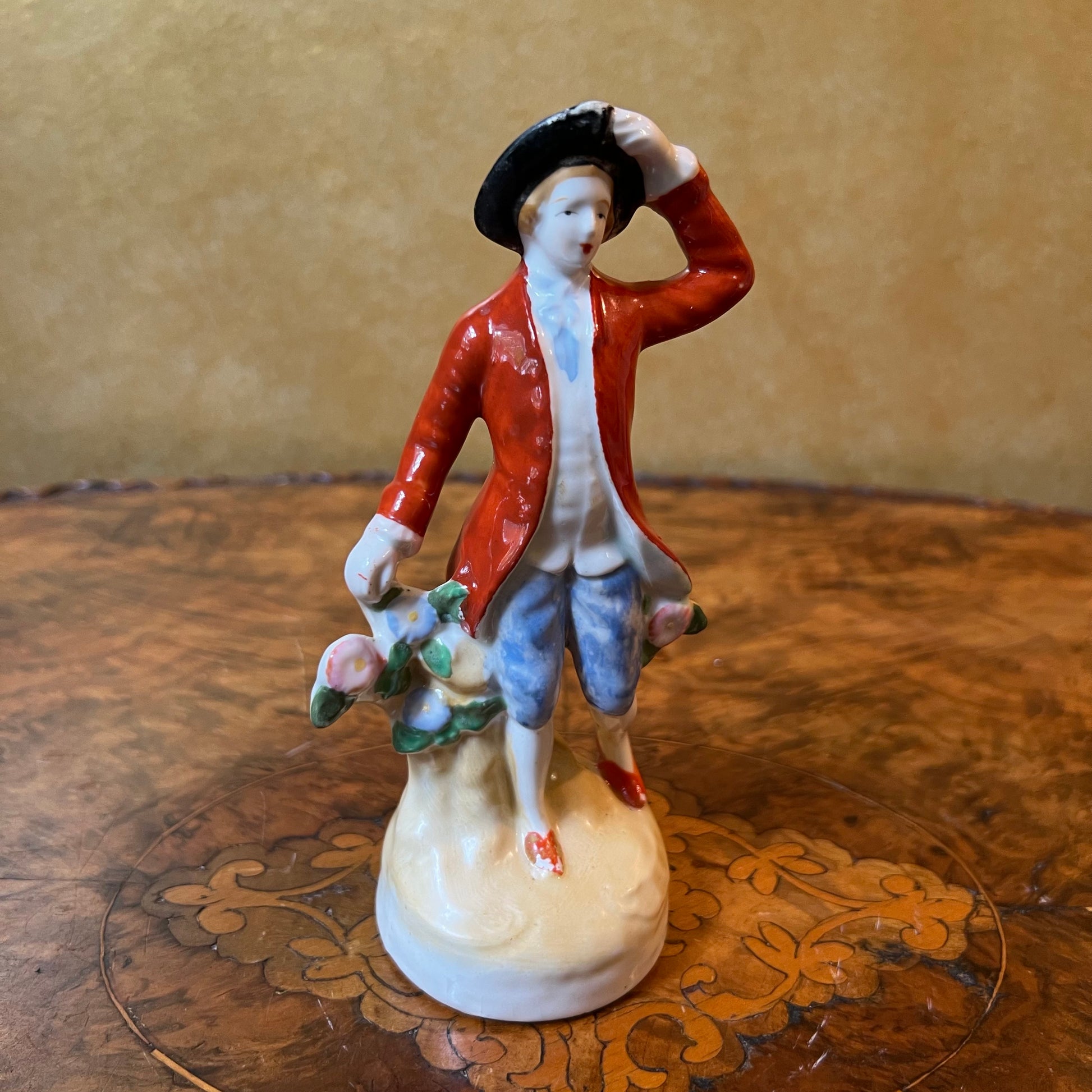Vintage Red Coat Man Statue 
